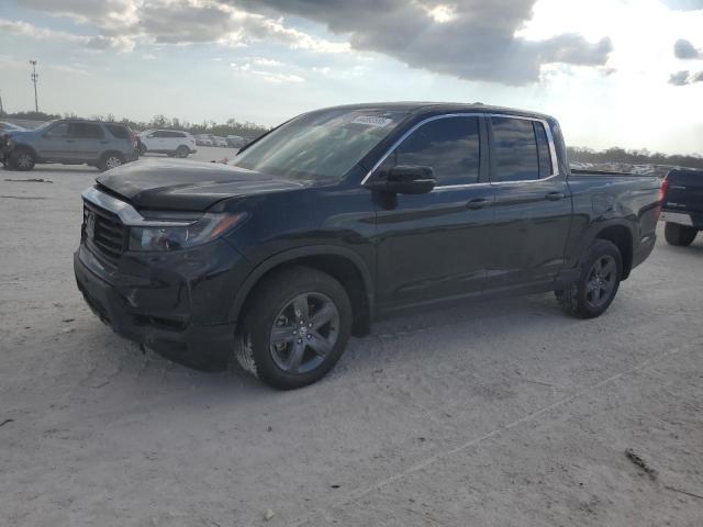 Photo 1 from auction – 2023 HONDA RIDGELINE with VIN 5FPYK3F57PB057879