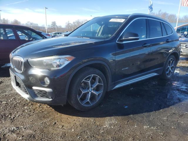 BMW X1 XDRIVE2 2016 with VIN WBXHT3C39GP887345 - Photo from auction