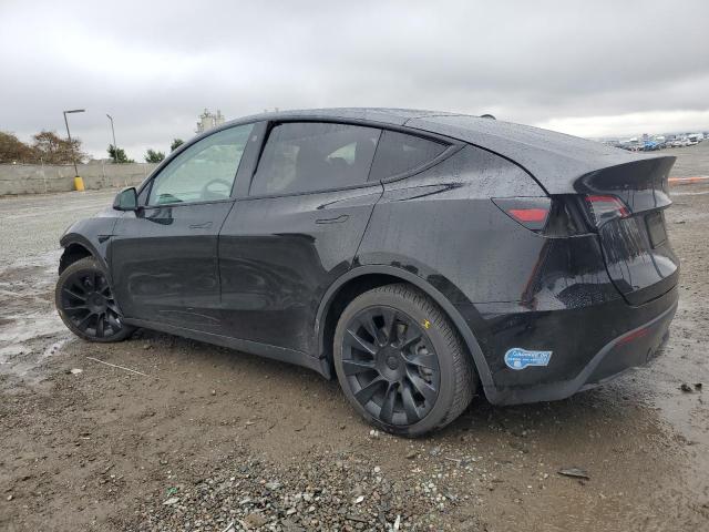 Снимка 2 от търг – 2021 TESLA MODEL Y с VIN 5YJYGAEE4MF207314
