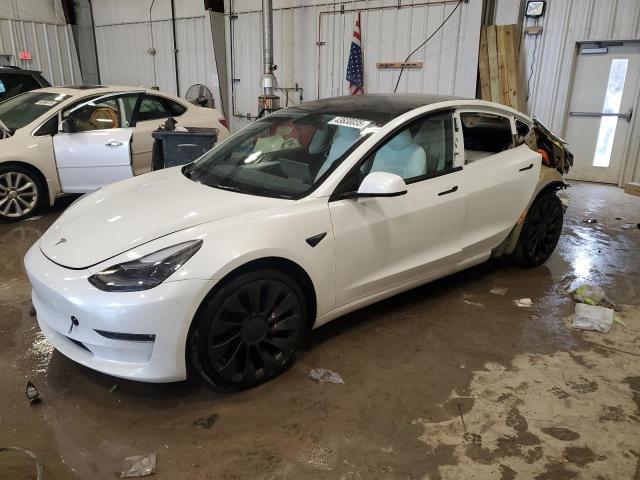 TESLA MODEL 3 2022 with VIN 5YJ3E1EC5NF299145 - Photo from auction