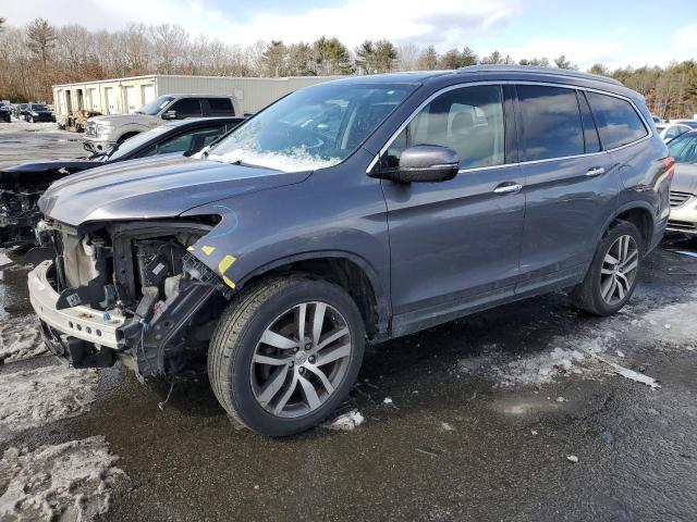 HONDA PILOT TOUR 2016 with VIN 5FNYF6H90GB119704 - Photo from auction