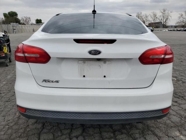 Photo 6 from auction – 2018 FORD FOCUS S with VIN 1FADP3E28JL304000