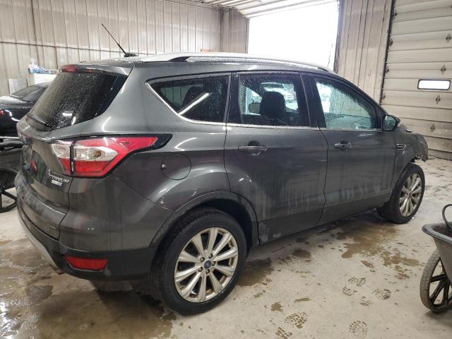 Photo 3 from auction – 2017 FORD ESCAPE TIT with VIN 1FMCU9JDXHUD21020