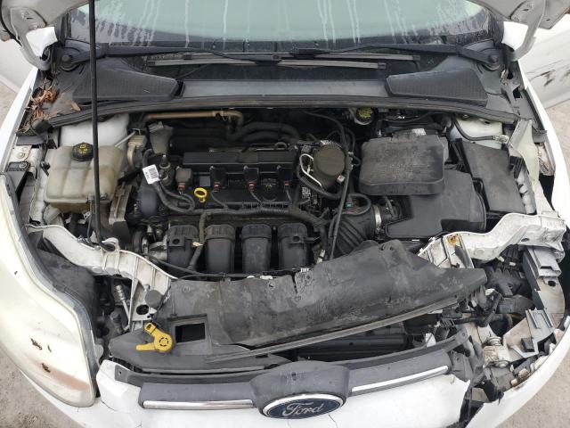 Photo 11 from auction – 2014 FORD FOCUS S with VIN 1FADP3E21EL414487