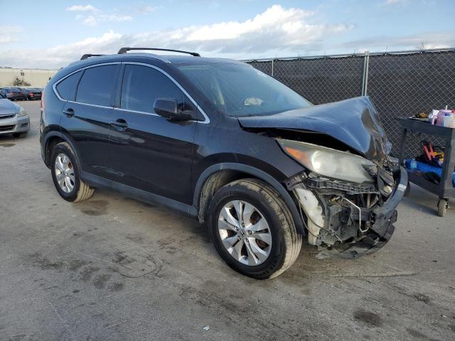 Photo 4 from auction – 2013 HONDA CR-V EXL with VIN 5J6RM4H70DL084601