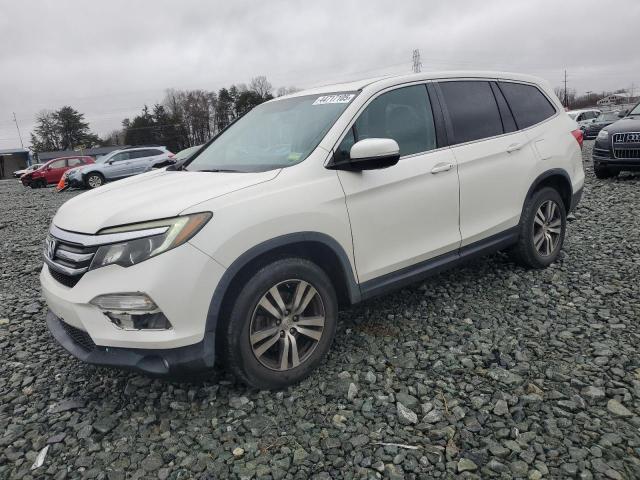 HONDA PILOT EXL 2016 with VIN 5FNYF6H59GB054462 - Photo from auction