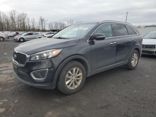 KIA SORENTO LX 2016 with VIN 5XYPG4A35GG085805 - Photo from auction