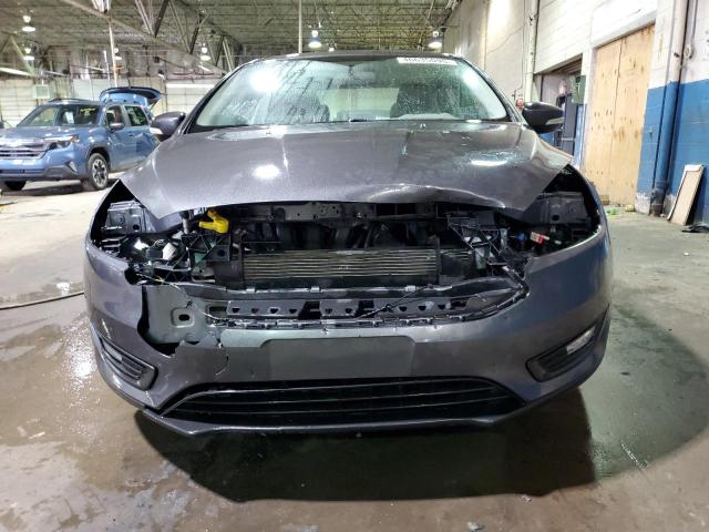 Photo 5 from auction – 2015 FORD FOCUS SE with VIN 1FADP3F21FL201071