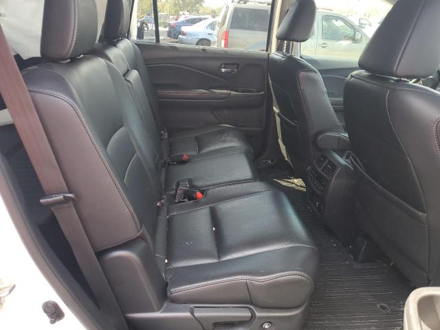 Photo 11 from auction – 2020 HONDA PILOT TOUR with VIN 5FNYF5H99LB003809