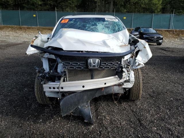 Photo 12 from auction – 2021 HONDA PASSPORT E with VIN 5FNYF8H55MB038797
