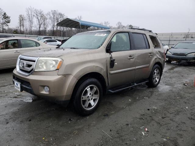 HONDA PILOT TOUR 2010 with VIN 5FNYF3H96AB017992 - Photo from auction