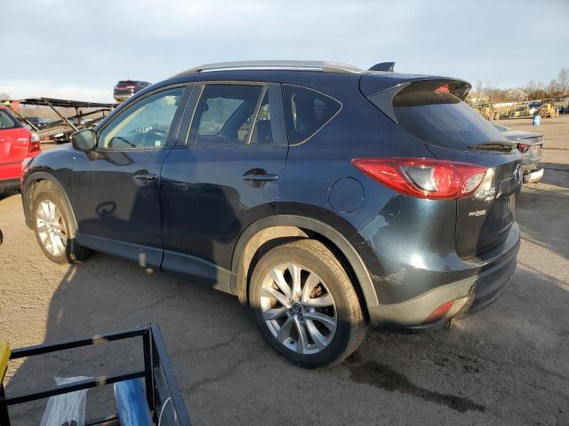 Photo 2 from auction – 2015 MAZDA CX-5 GT with VIN JM3KE4DY9F0474952