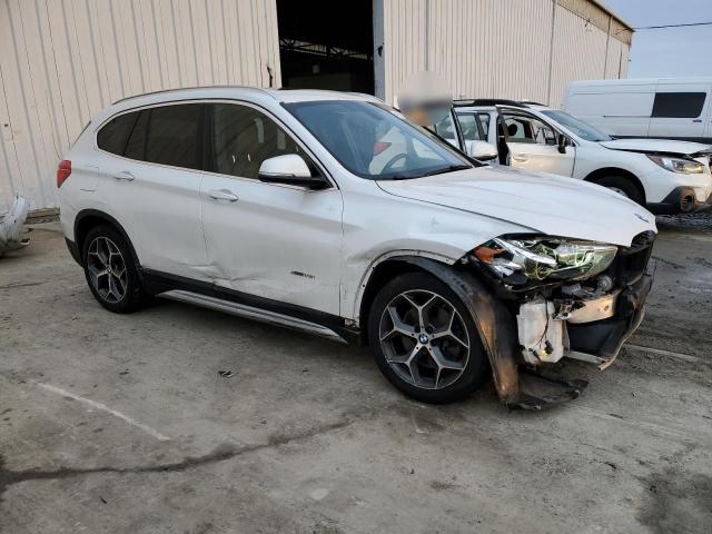 Photo 4 from auction – 2017 BMW X1 XDRIVE2 with VIN WBXHT3C31H5F70059