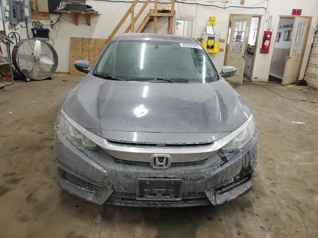 Photo 5 from auction – 2016 HONDA CIVIC LX with VIN 19XFC2F53GE000480