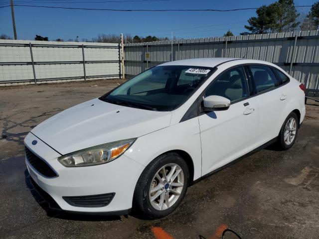 FORD FOCUS SE 2016 with VIN 1FADP3F21GL393349 - Photo from auction