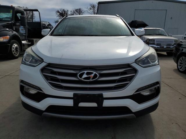 Photo 5 from auction – 2017 HYUNDAI SANTA FE S with VIN 5NMZU3LBXHH013957
