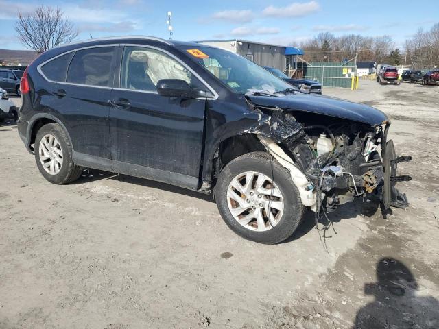Photo 4 from auction – 2015 HONDA CR-V EXL with VIN 2HKRM4H79FH654902