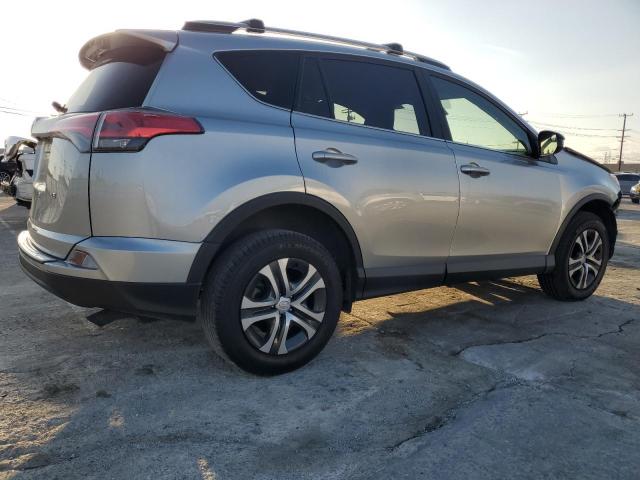 Photo 3 from auction – 2018 TOYOTA RAV4 LE with VIN JTMZFREV3JJ186031
