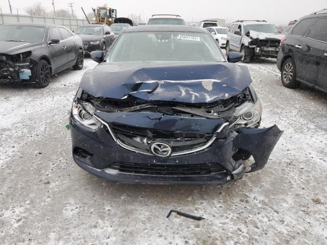 Photo 5 from auction – 2015 MAZDA 3 with VIN JM1GJ1W55F1224677