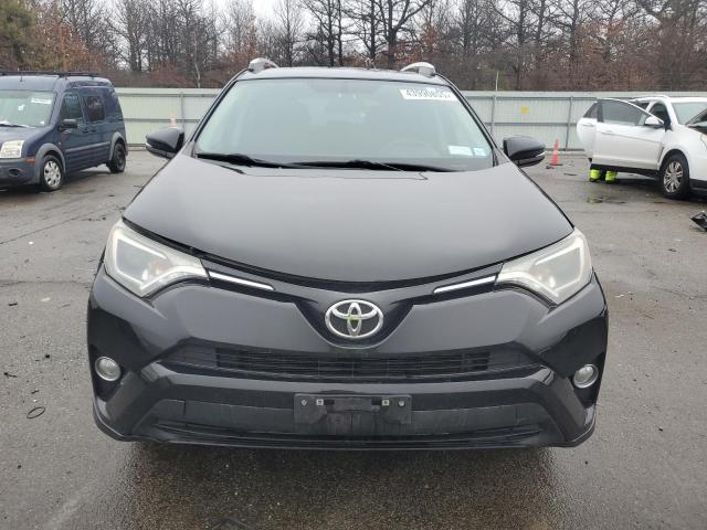 Photo 5 from auction – 2016 TOYOTA RAV4 XLE with VIN 2T3RFREV7GW470014