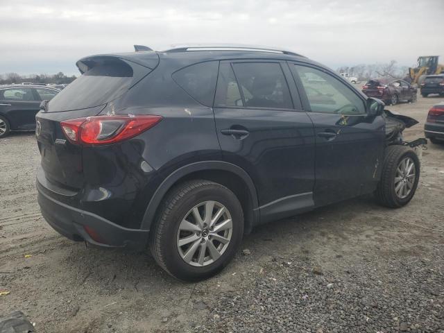 Photo 3 from auction – 2014 MAZDA CX-5 TOURI with VIN JM3KE2CY3E0429347