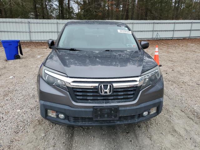 Photo 5 from auction – 2017 HONDA RIDGELINE with VIN 5FPYK3F64HB021173