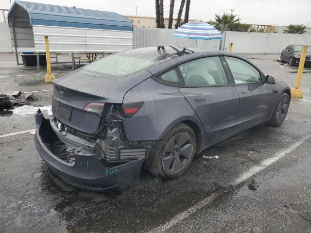 Снимка 3 от търг – 2023 TESLA MODEL 3 с VIN 5YJ3E1EA4PF711900
