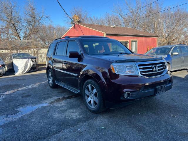 HONDA PILOT TOUR 2014 with VIN 5FNYF3H95EB001451 - Photo from auction