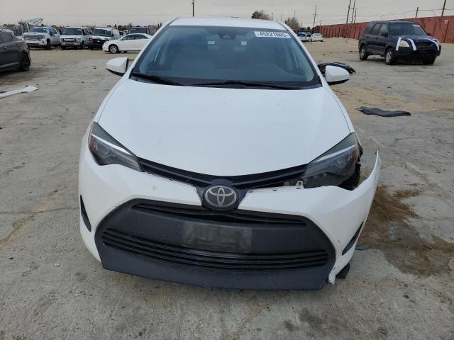 Photo 5 from auction – 2018 TOYOTA COROLLA L with VIN 2T1BURHE8JC969487