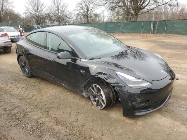 Photo 4 from auction – 2021 TESLA MODEL 3 with VIN 5YJ3E1EA3MF977307