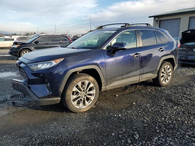 TOYOTA RAV4 LIMIT 2019 with VIN JTMN1RFV7KD011566 - Photo from auction