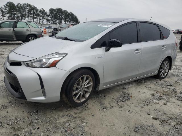 TOYOTA PRIUS V 2015 with VIN JTDZN3EU1FJ021528 - Photo from auction