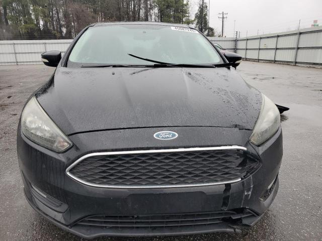 Photo 5 from auction – 2015 FORD FOCUS SE with VIN 1FADP3F25FL311315