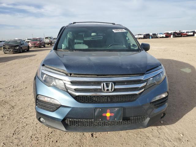 Photo 5 from auction – 2018 HONDA PILOT EXLN with VIN 5FNYF6H75JB045802