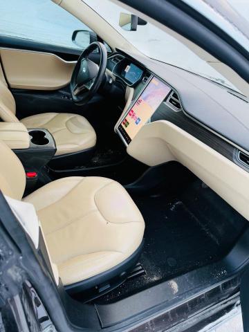 Photo 5 from auction – 2014 TESLA MODEL S with VIN 5YJSA1H10EFP51925