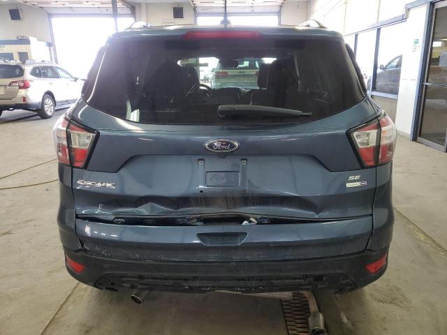 Photo 6 from auction – 2018 FORD ESCAPE SE with VIN 1FMCU9GD3JUC19653