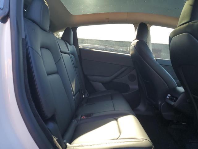Photo 11 from auction – 2023 TESLA MODEL Y with VIN 7SAYGDEE0PF683083