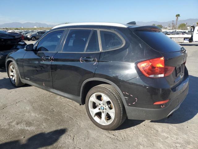 Photo 2 from auction – 2015 BMW X1 SDRIVE2 with VIN WBAVM1C50FVW57137