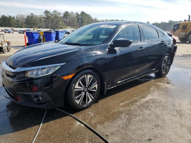 HONDA CIVIC EX 2017 with VIN 19XFC1F30HE016615 - Photo from auction