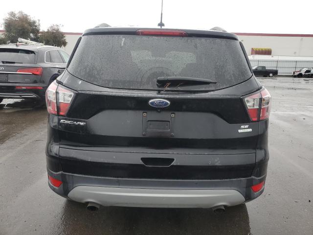 Photo 6 from auction – 2017 FORD ESCAPE SE with VIN 1FMCU0GD8HUC67767