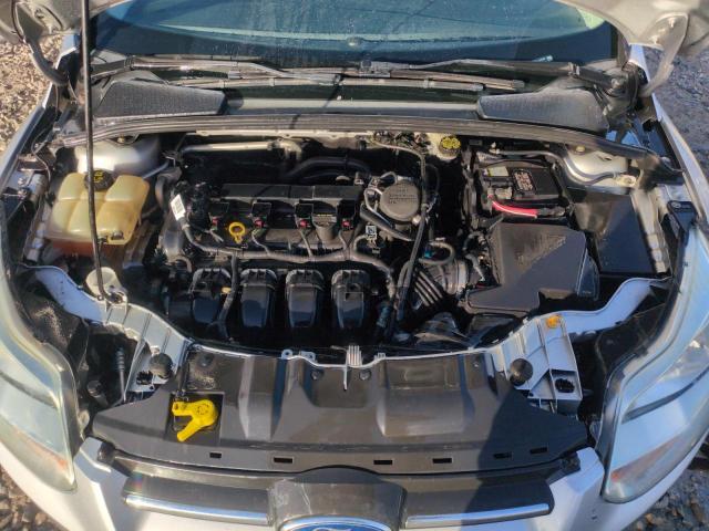 Photo 11 from auction – 2014 FORD FOCUS S with VIN 1FADP3E20EL132048