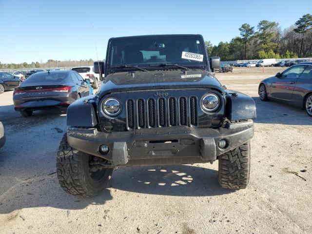 Photo 5 from auction – 2016 JEEP WRANGLER U with VIN 1C4BJWEG8GL256328