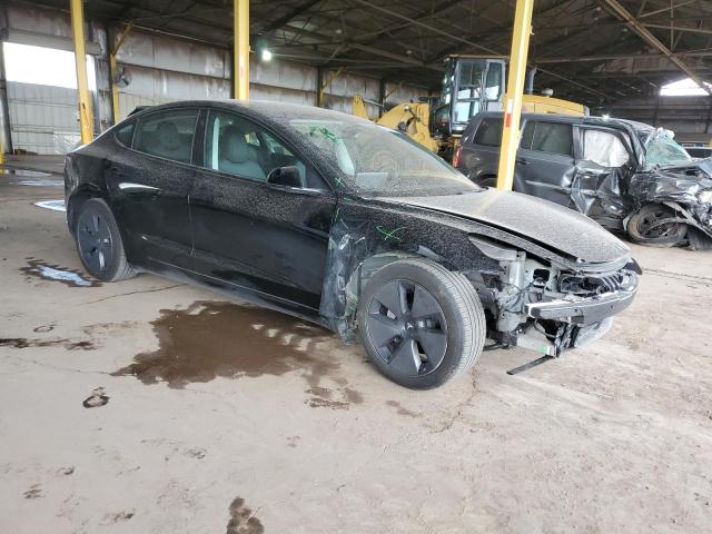 Photo 4 from auction – 2023 TESLA MODEL 3 with VIN 5YJ3E1EA2PF692926