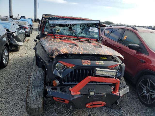 Photo 5 from auction – 2011 JEEP WRANGLER U with VIN 1J4BZ3H17BL599763