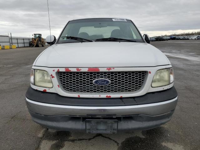 Photo 5 from auction – 1999 FORD F150 with VIN 1FTRX17W3XKA29073