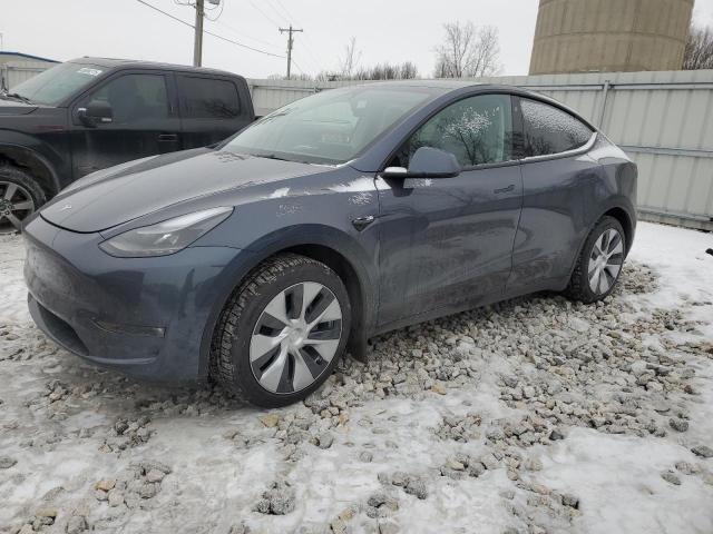TESLA MODEL Y 2023 with VIN 7SAYGDEE4PF669994 - Photo from auction