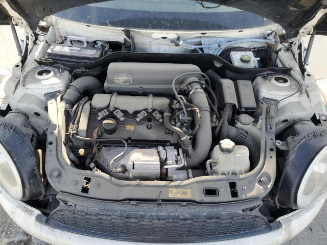 Photo 11 from auction – 2013 MINI COOPER COU with VIN WMWSX3C55DT772606