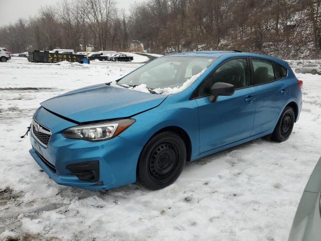 SUBARU IMPREZA 2018 with VIN 4S3GTAA65J3714012 - Photo from auction