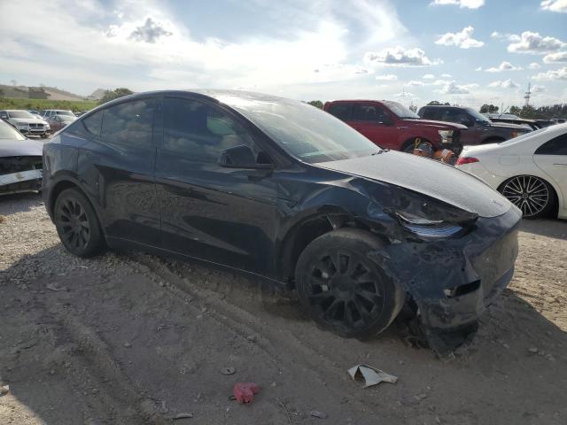 Снимка 4 от търг – 2022 TESLA MODEL Y с VIN 7SAYGDEE6NA006386
