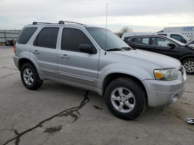 Photo 4 from auction – 2005 FORD ESCAPE LIM with VIN 1FMYU04125KE23079